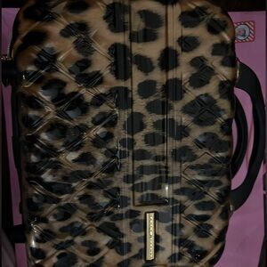 Marcy Mckenna leopard print, beauty, suitcase, tote